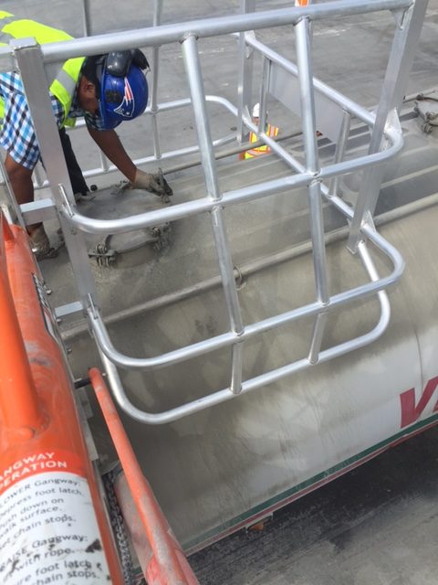 Offset safety cage for cement idustry