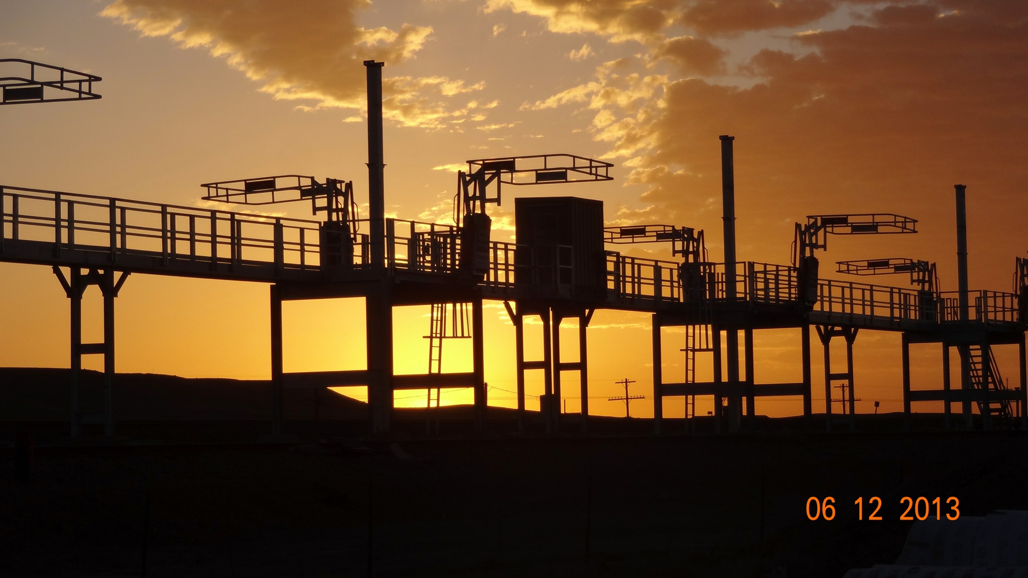 SafeRack Crude Oil Railcar Loading Platform at Sunset