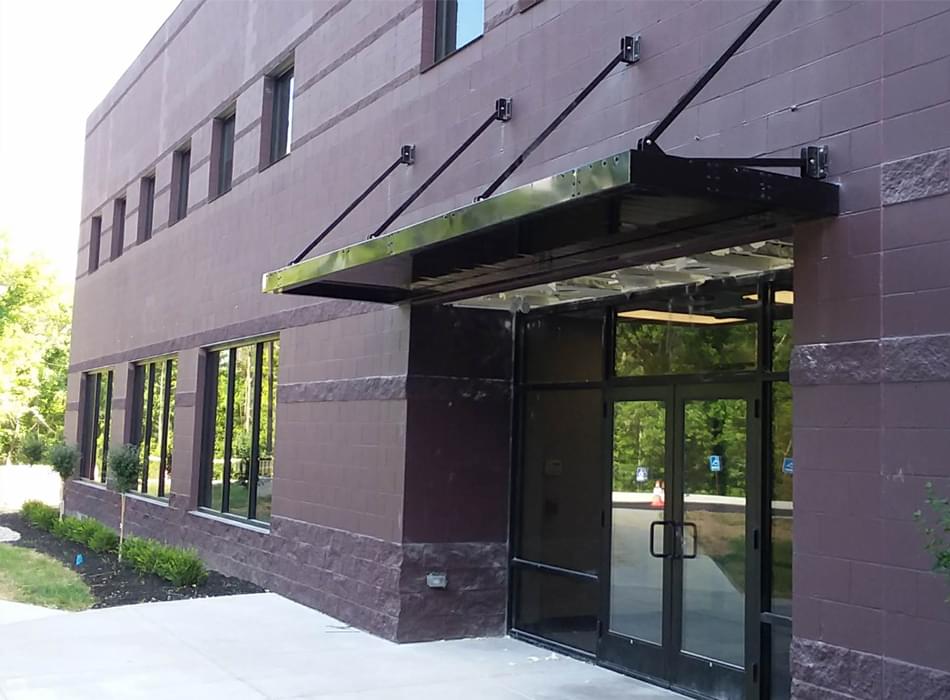 Commercial metal awning for office building entrance